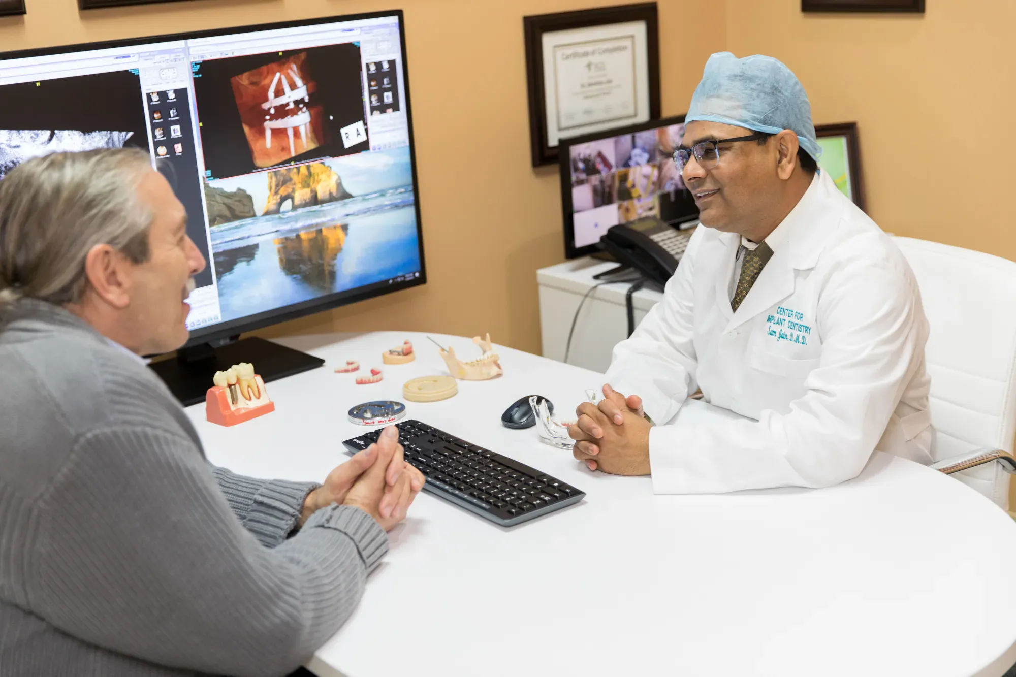 Dr. Sam Jain offering a free dental implant consultation