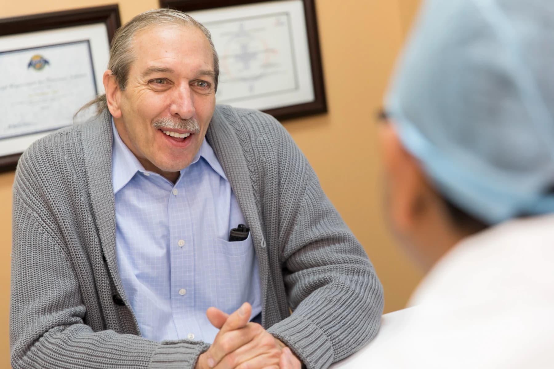Patient consulting with implant Experts at Center for Implant Dentistry