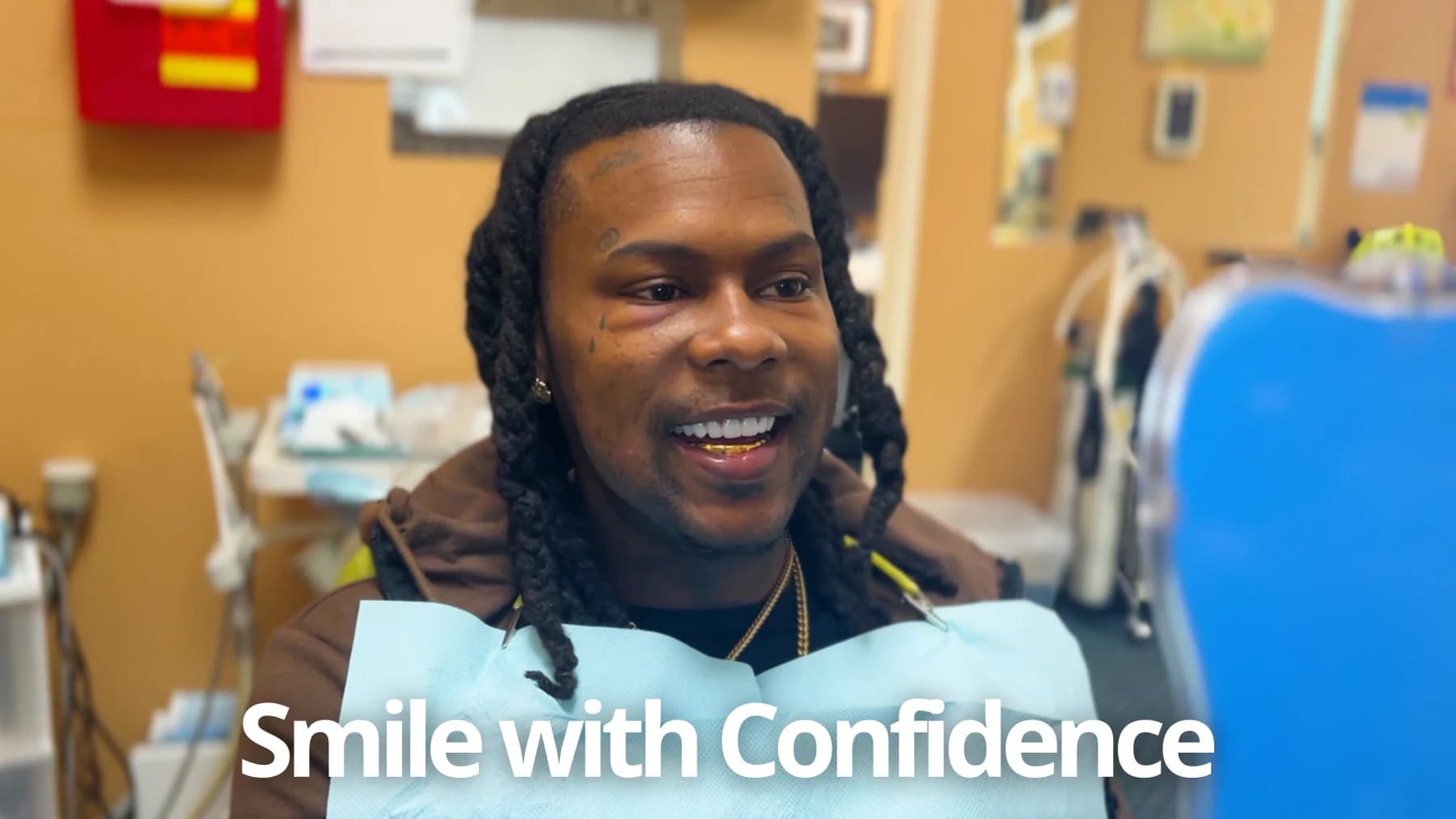 Patient smiling confidently after dental implant treatment